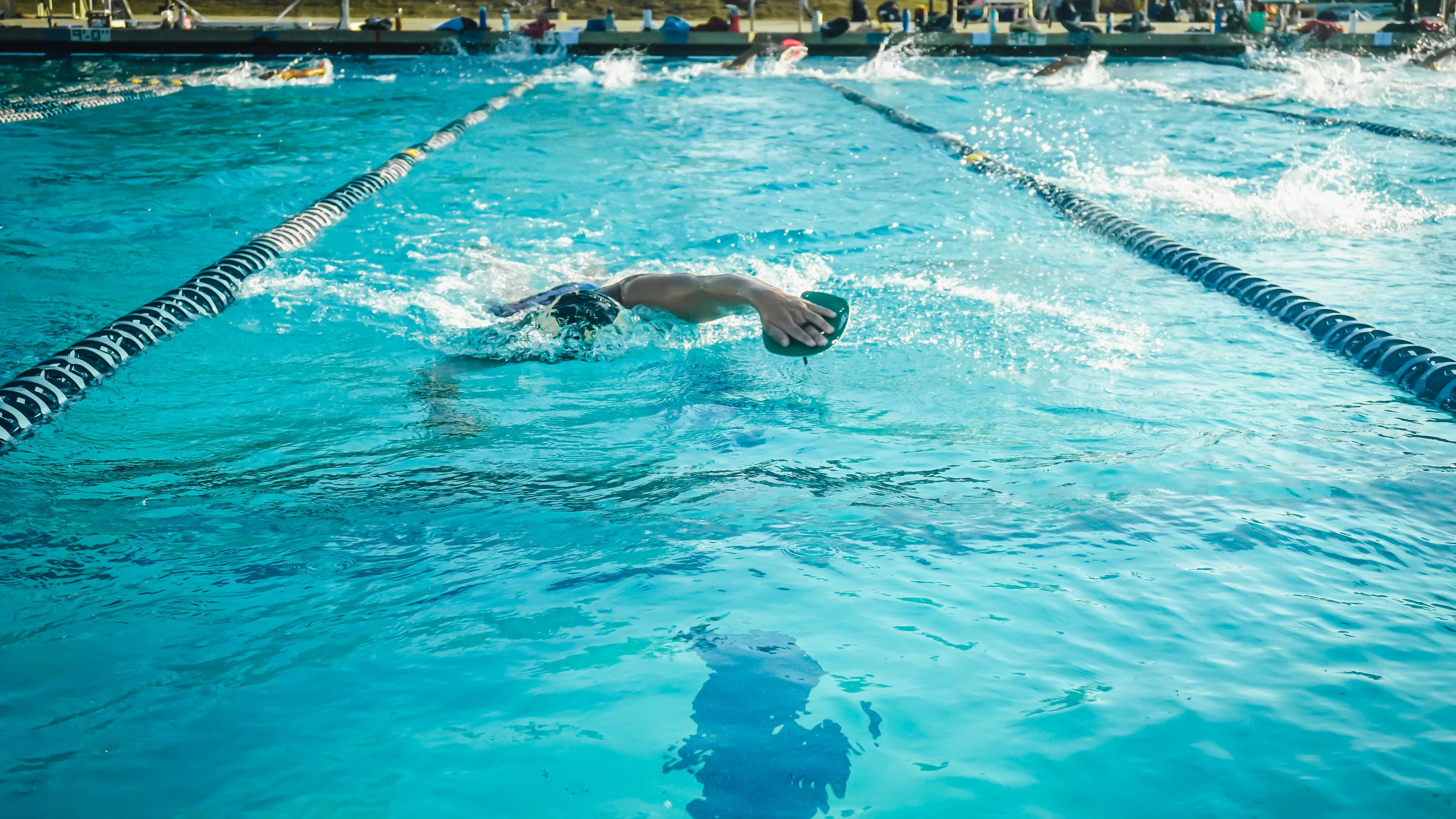 Underwater swimmer highlighting JBSA-Randolph pool dynamics.
