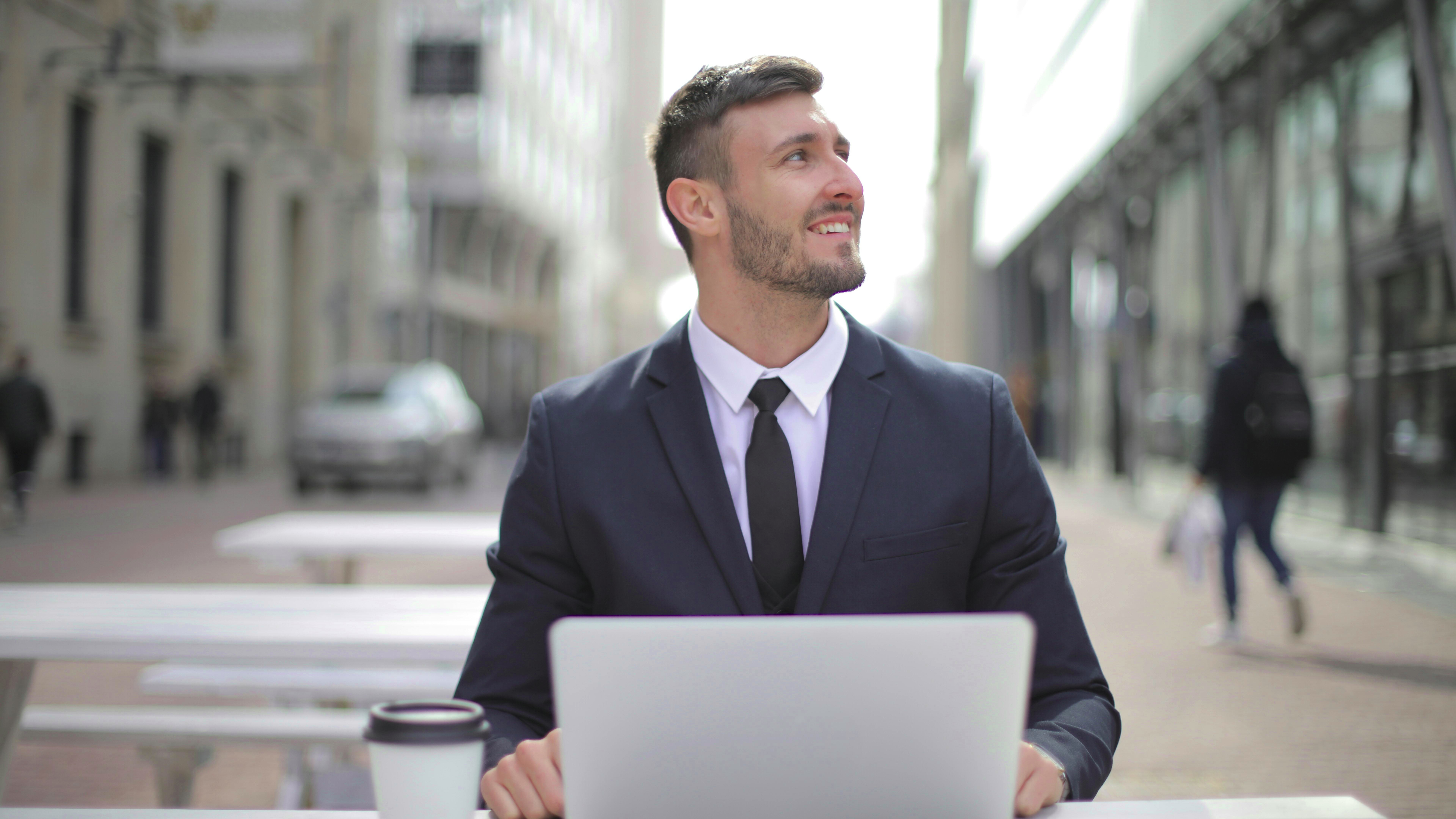 Stylized FCC emblem with satellites, representing broadband transparency.