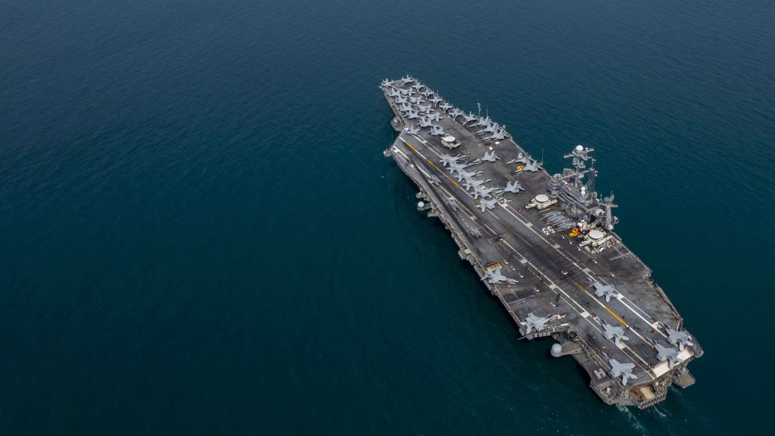 WWII naval battle with Fritz X radio-controlled glide bomb impact.