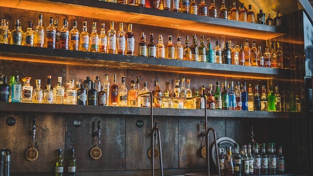 San Antonio nightlife: vibrant bar with neon lights and patrons.