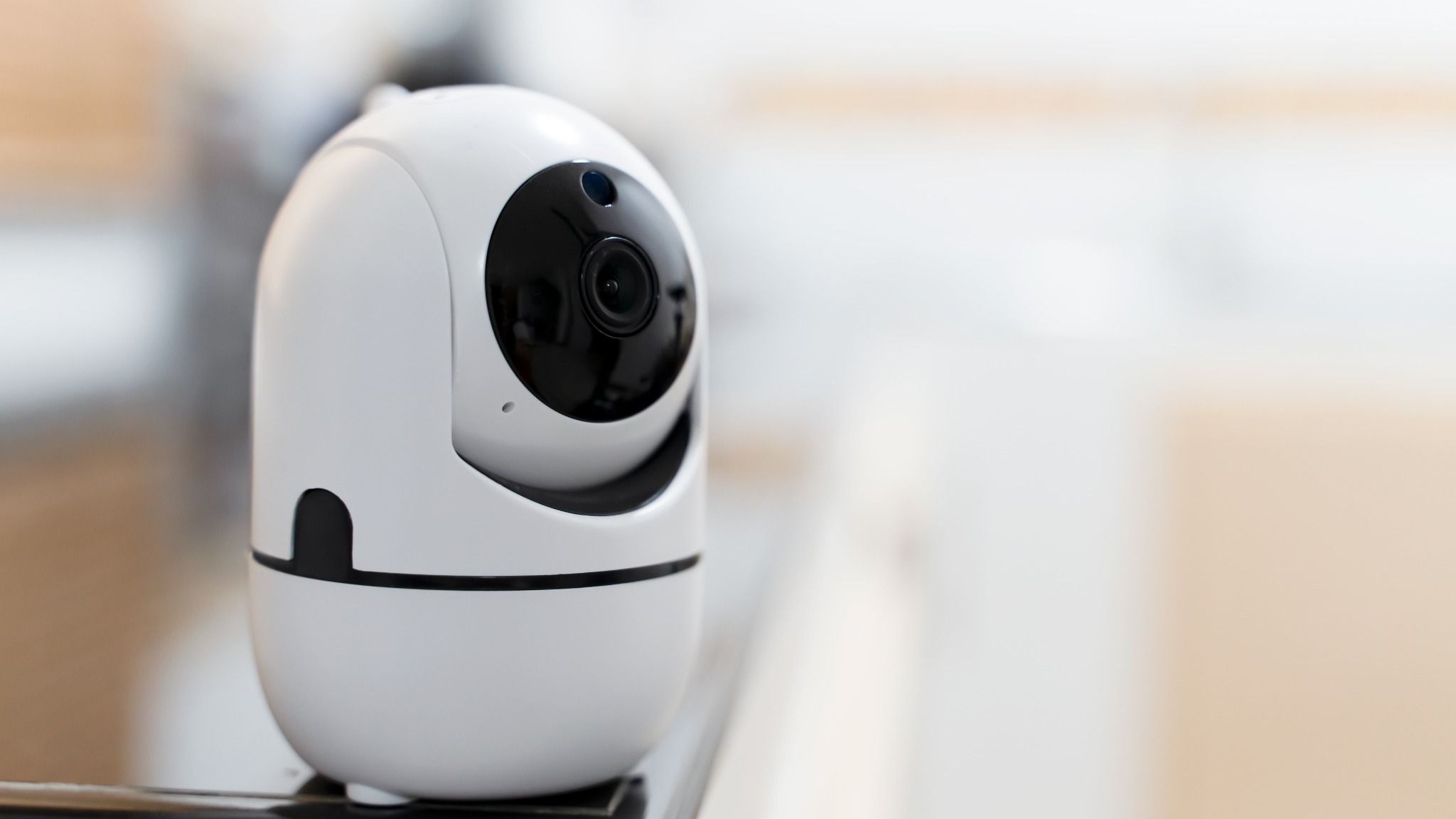 Comparison of three wireless security cameras showcasing designs.