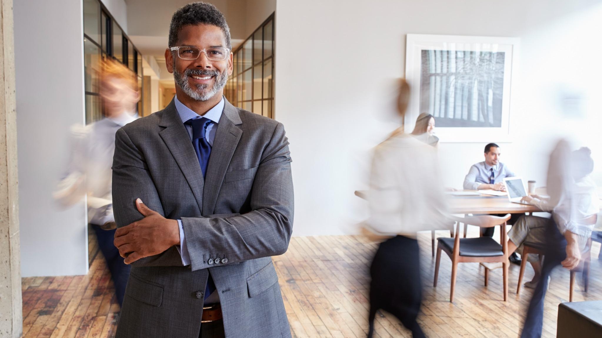 Futuristic employee experience strategy concept with holographic figures.
