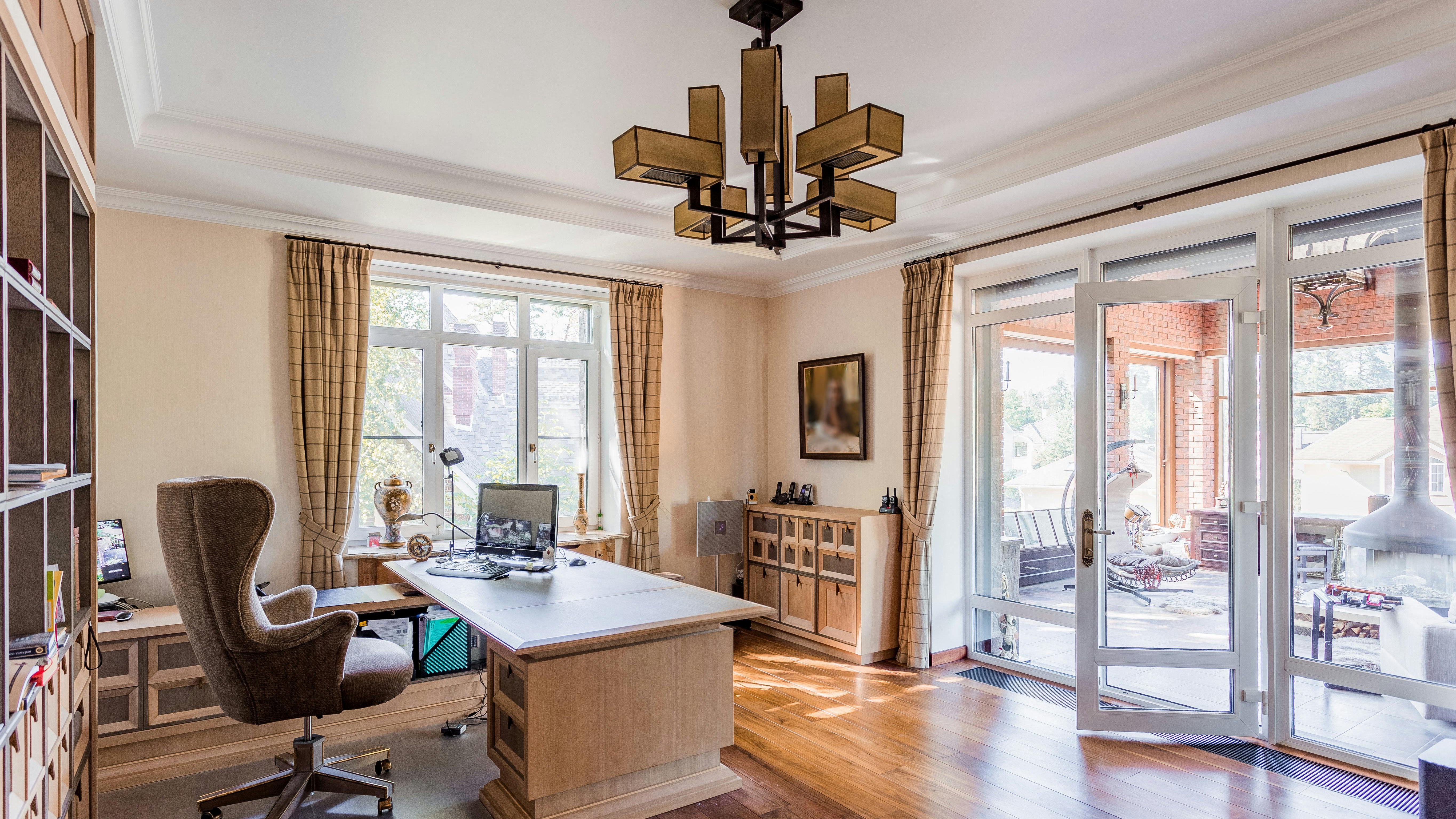 Bright dining room with modern decor showcasing ways to brighten a dark room.