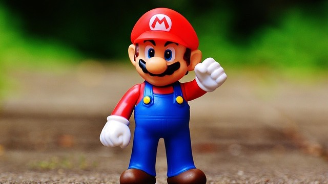 Child with Mario toy, related to Nintendo AI images controversy.