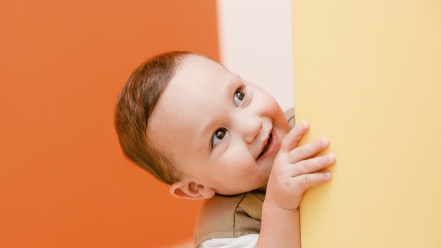 Smiling woman discussing ways to improve ADHD symptoms in children.