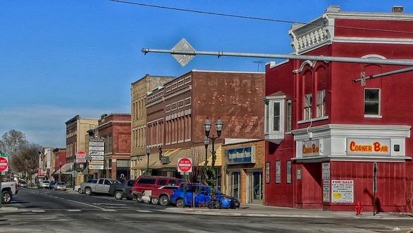 Nebraska Holiday Passport Program logo with scenic rock formation.