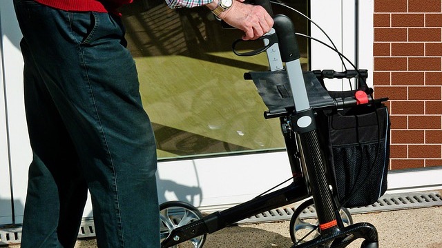 Military emblem with digital network background symbolizing AI in military decision making.