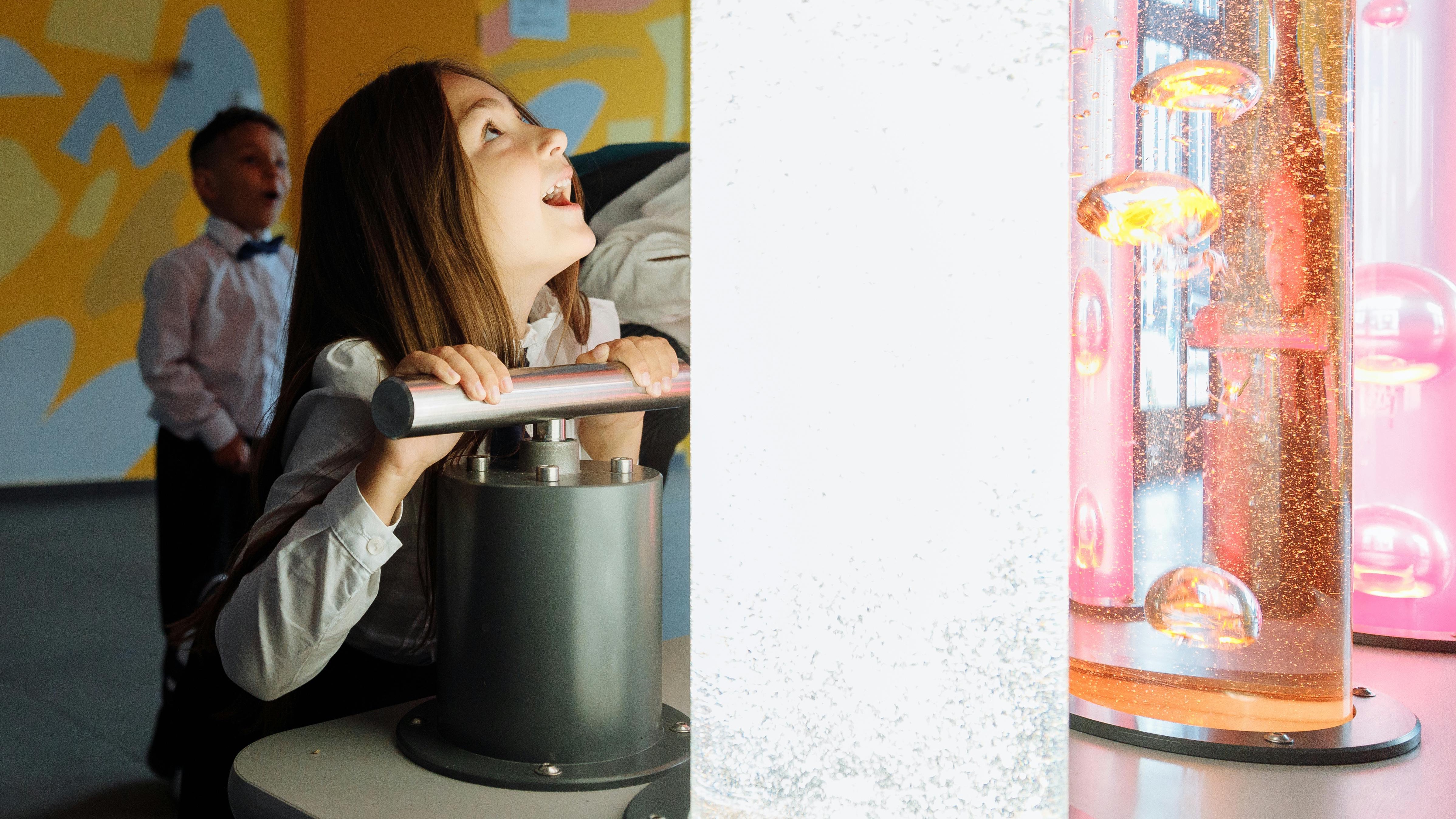 Colorful poster for kid-friendly events in San Antonio featuring a submarine theme.