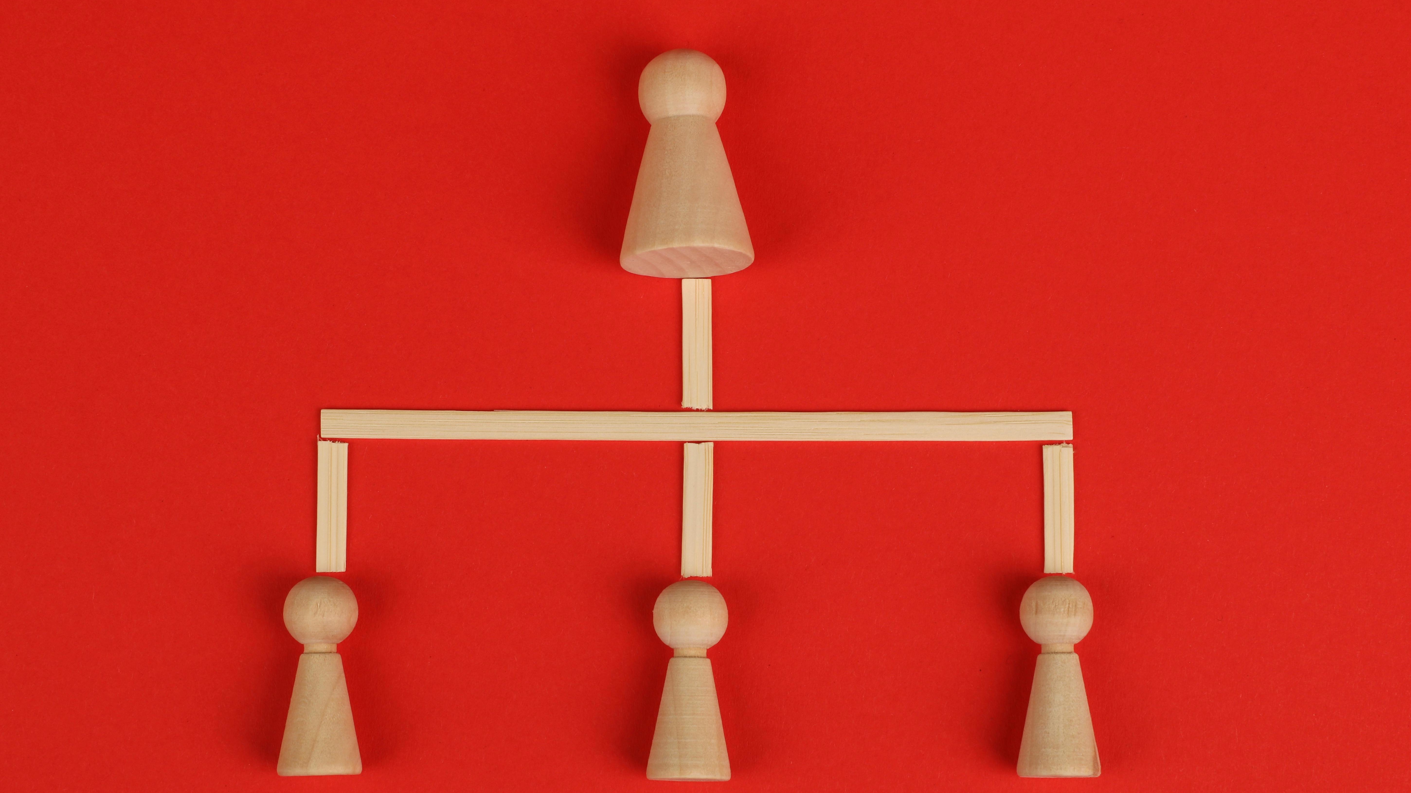 IVMF Ambassador Impact Award winners posing with awards against a warm-lit backdrop.