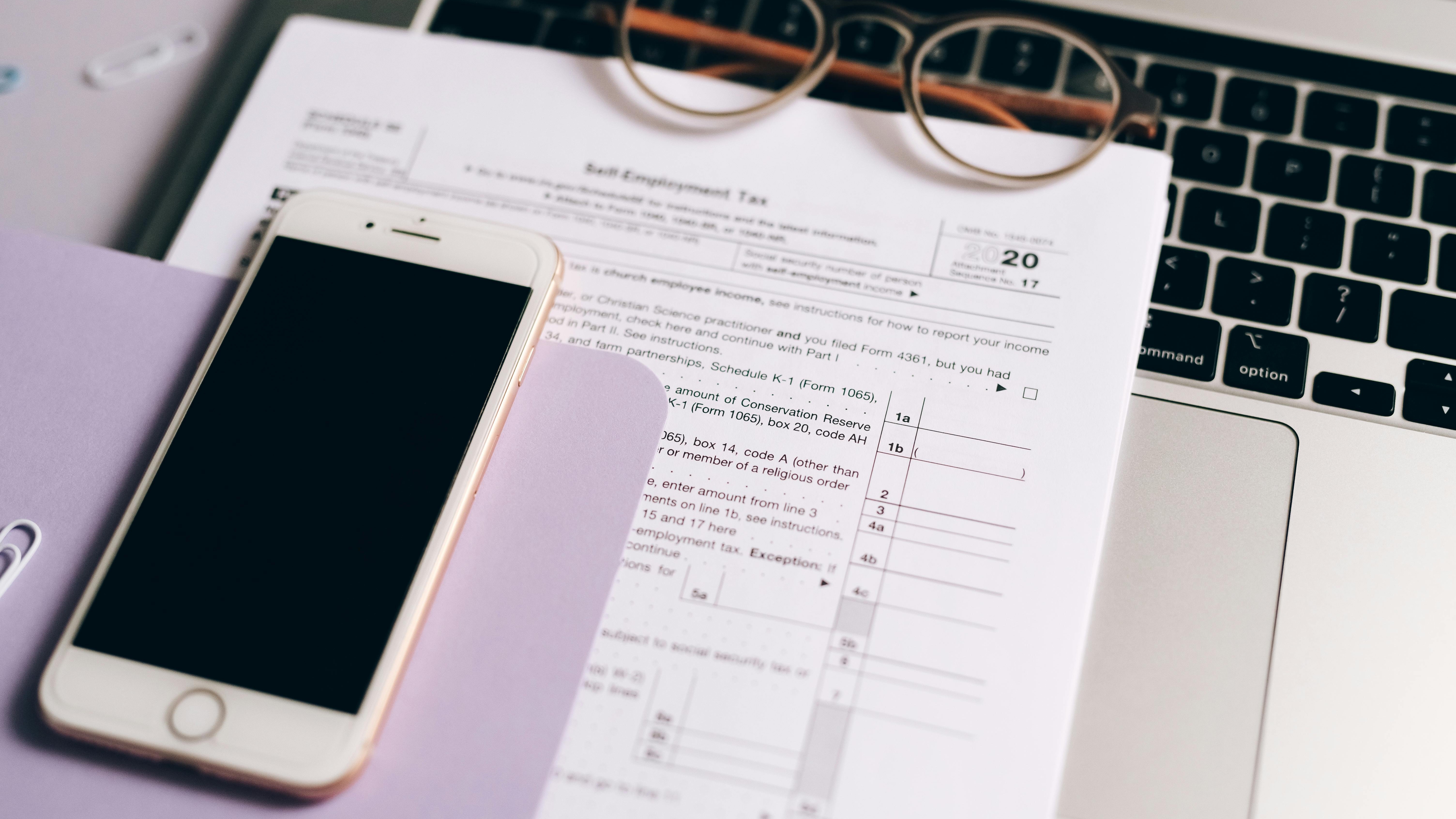 Three men discussing California billionaire tax response.