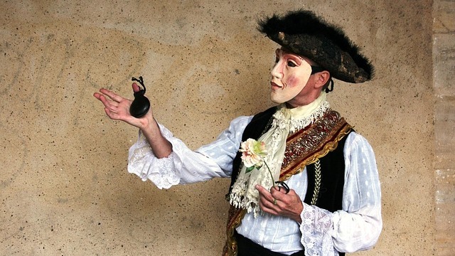 Joyful couple dancing in rain during 'The Notebook: The Musical' in Omaha