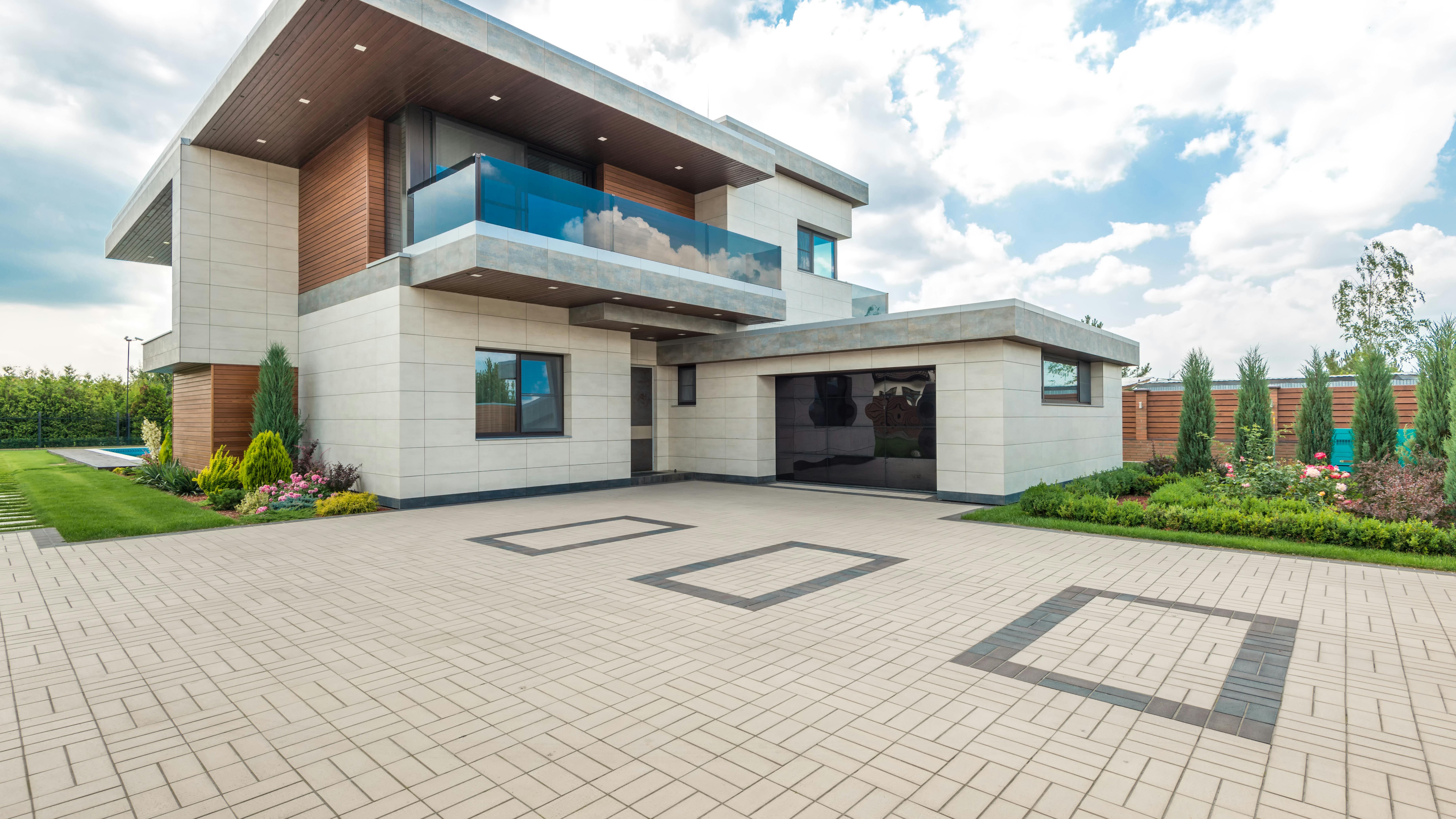 Smart home devices controlled via smartphone on a porch.