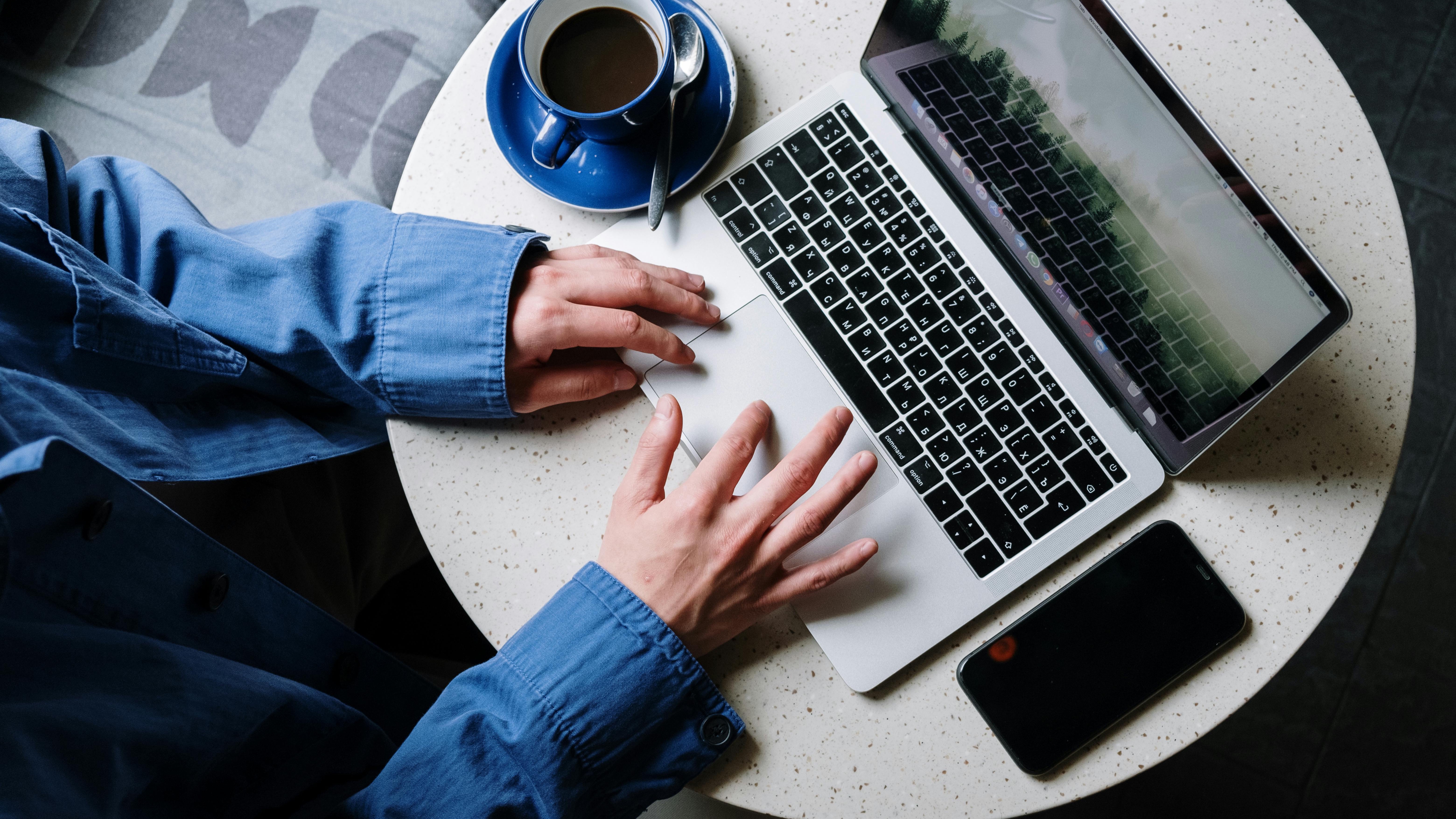 Minimalistic red icon with white lightning bolt.