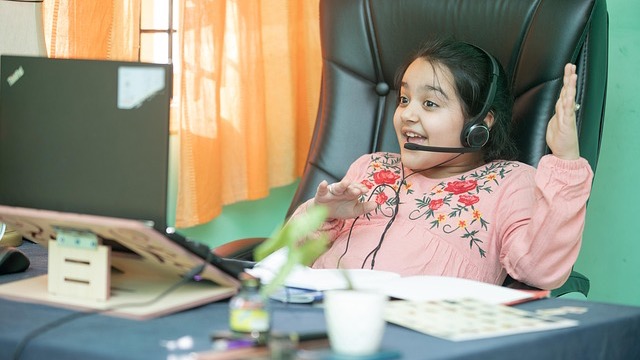 AI in Education: Cartoon robot with rocket under starry sky.