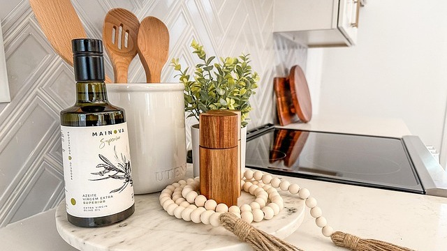 Joanna Gaines smiling beside rug from Target home decor sale.