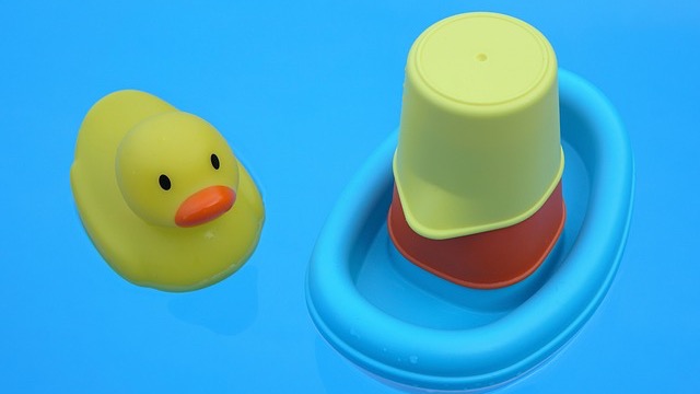 Blue and white striped pool bath design plans with modern decor.