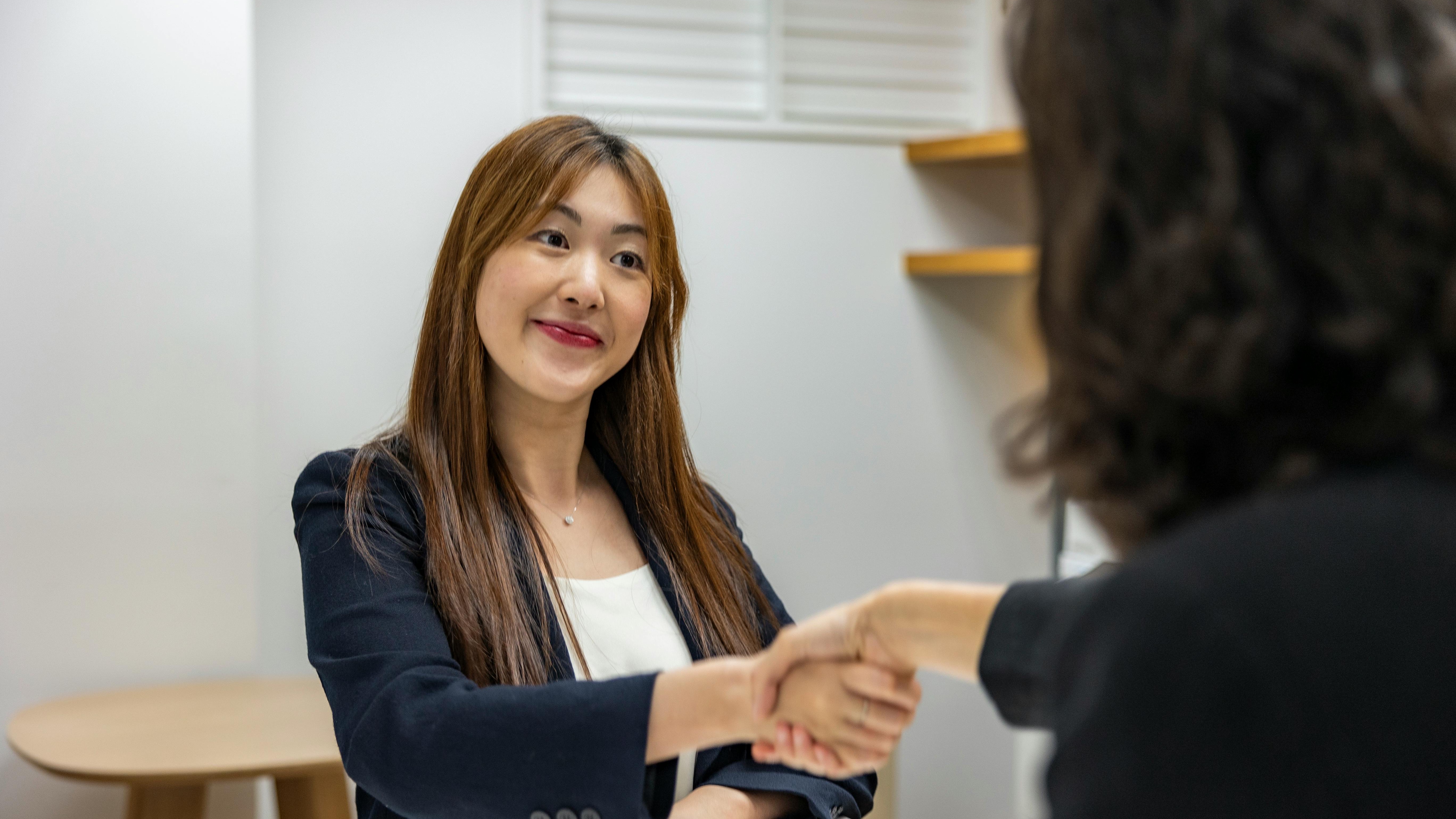 Guide on recruiter commission structure with illustrated character analyzing documents.