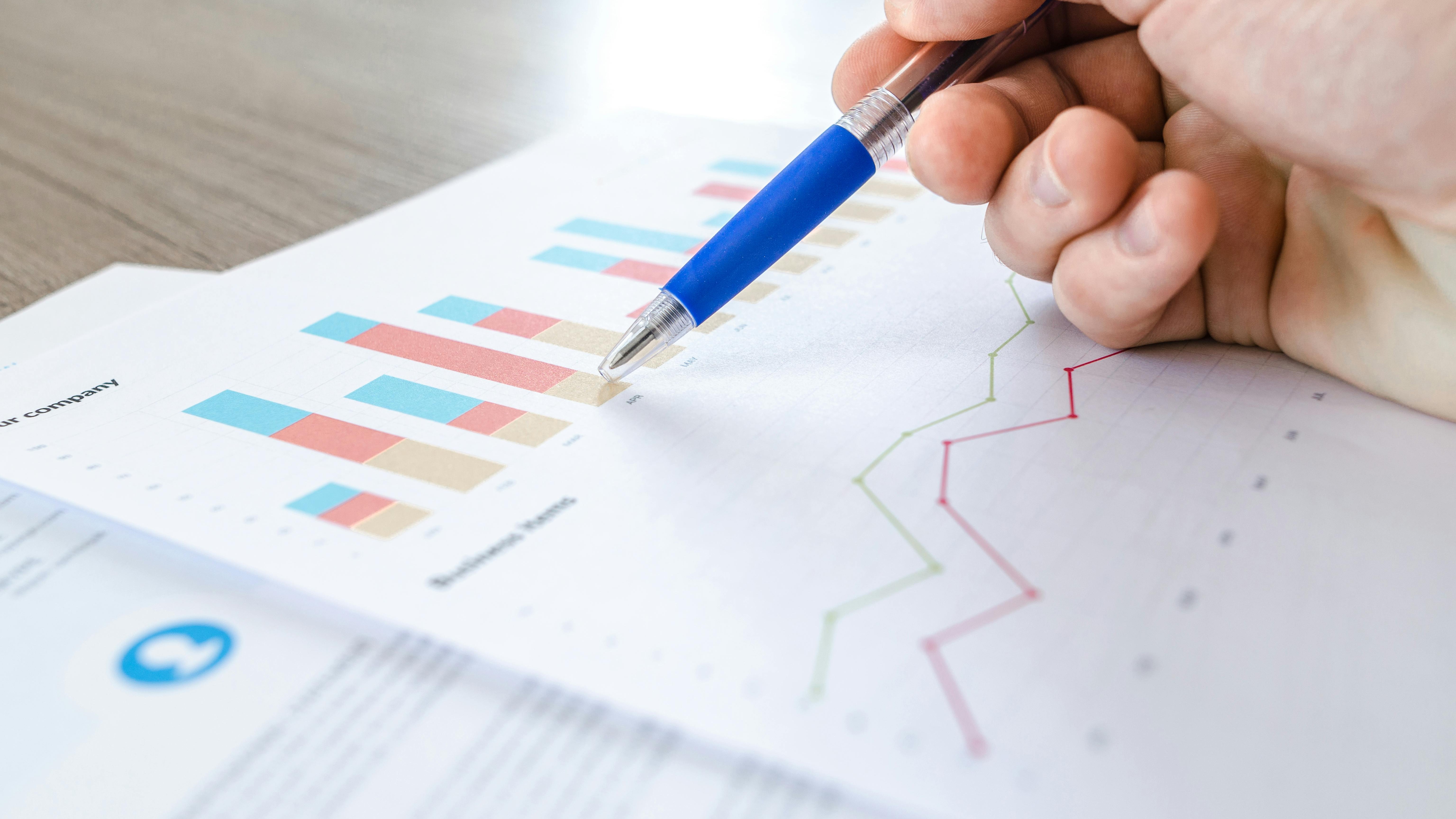 Man using virtual data interface for talent management strategies.