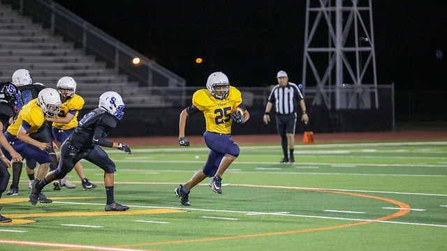 2025 service academy football report: players in intense game action