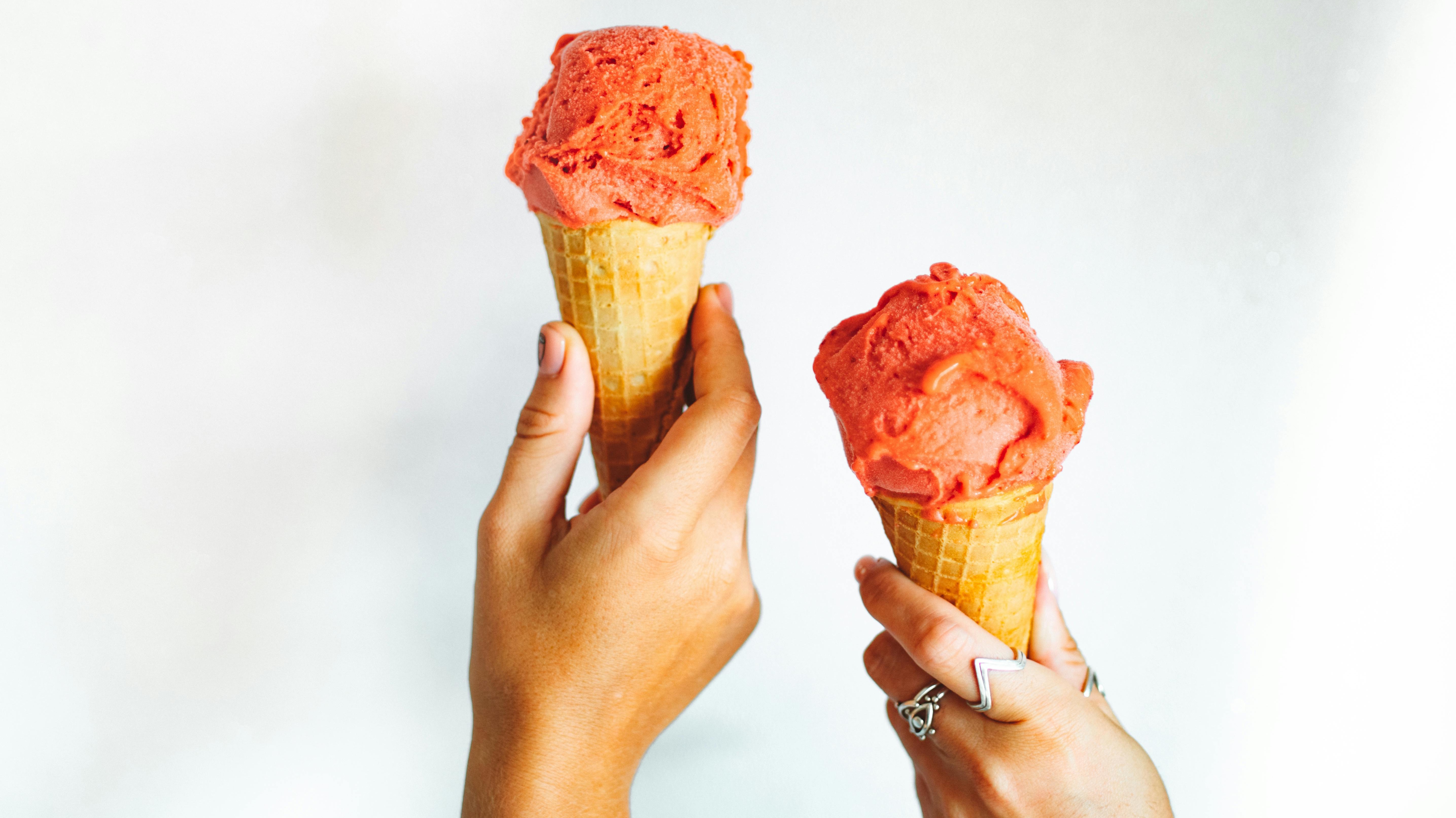 Free Cone Day at DQ promotion with ice cream cone and sky.