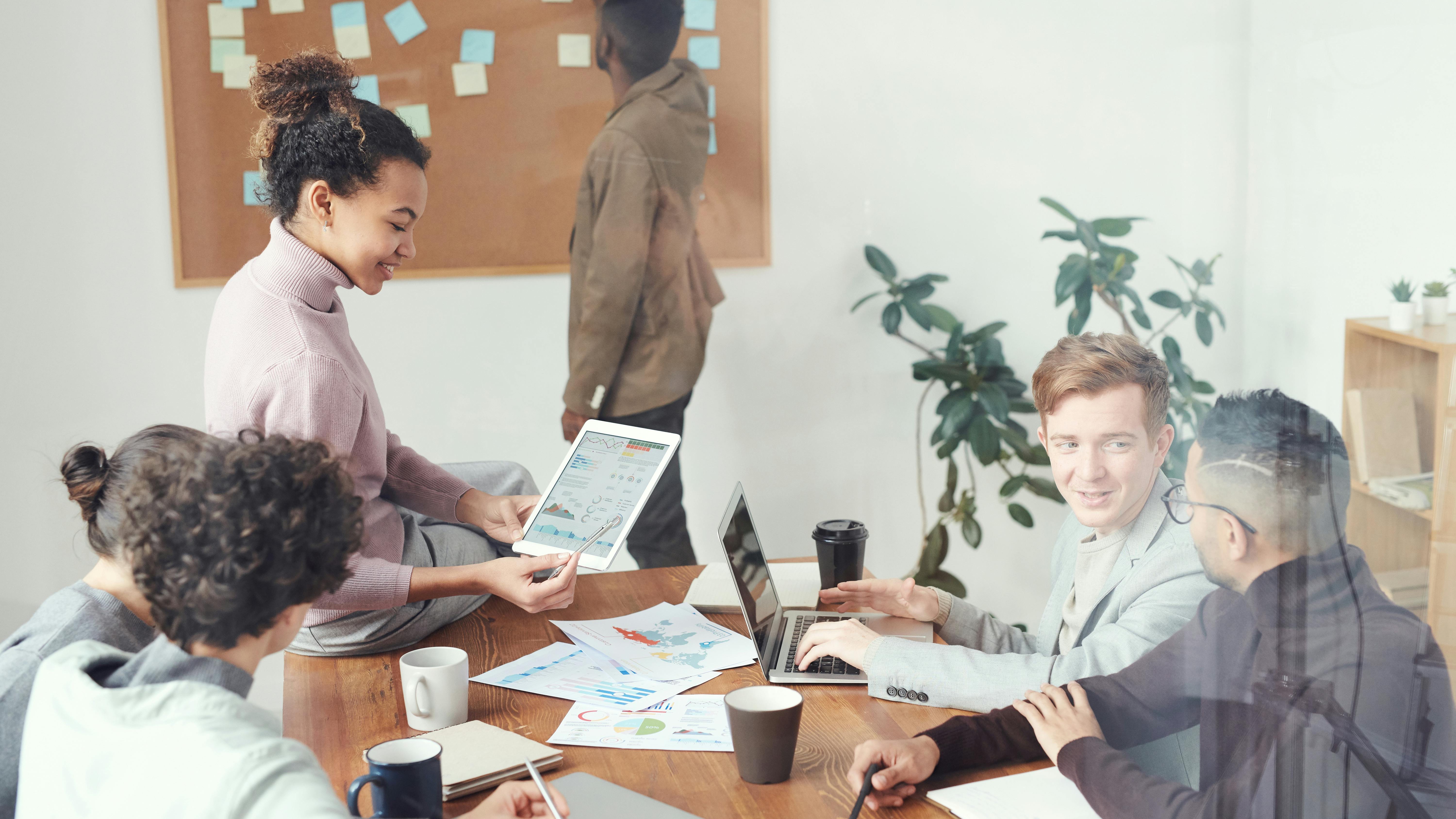 Creative light bulb on colorful sticky notes symbolizing HR technology innovation.