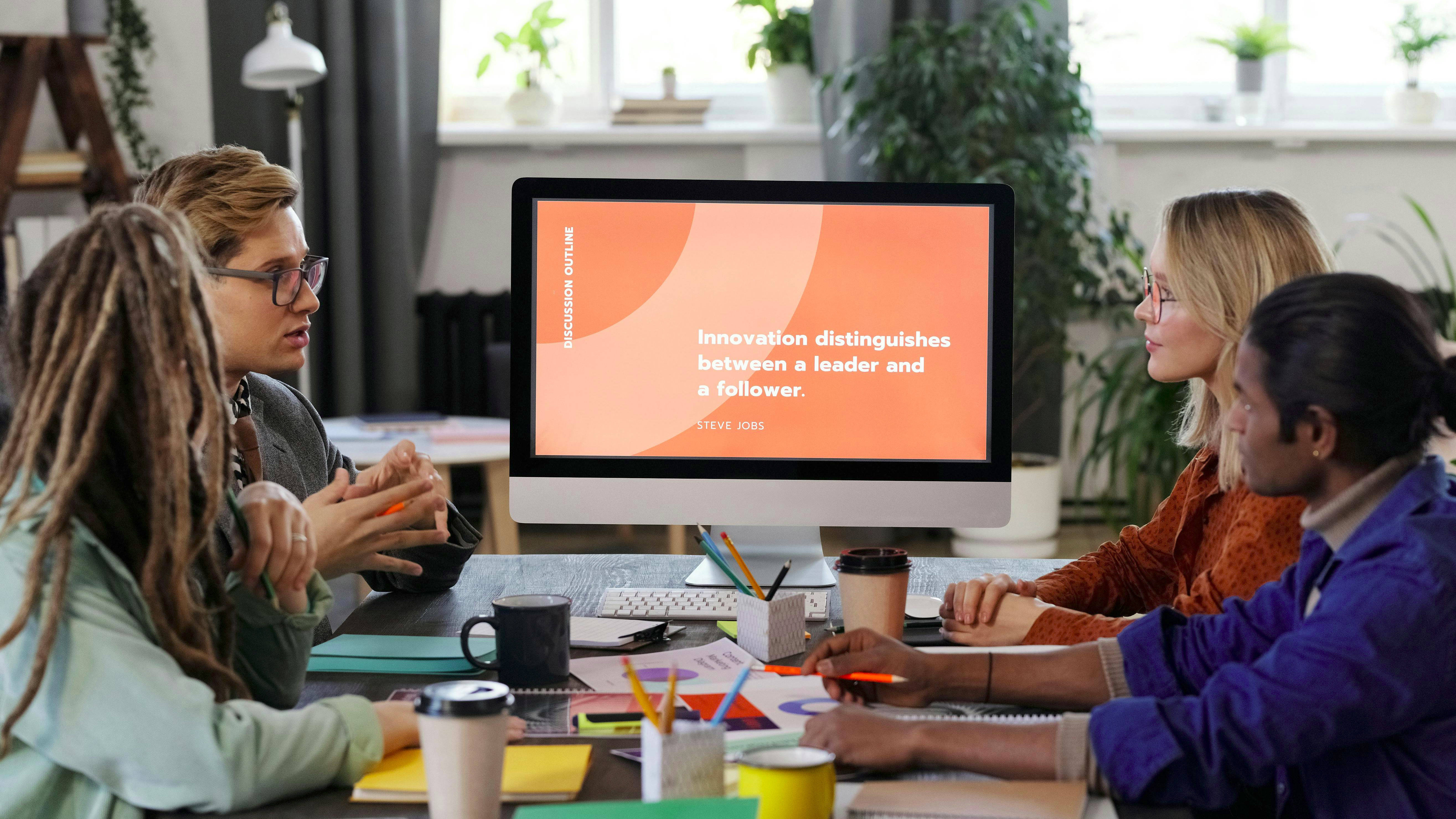 Modern corporate office building fostering community, aerial daytime view