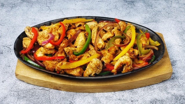 Lime squeezed onto fajitas at San Antonio barbecue showdown.
