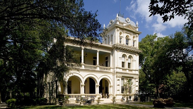 Leave a Legacy in San Antonio: Man and child walking hand in hand.