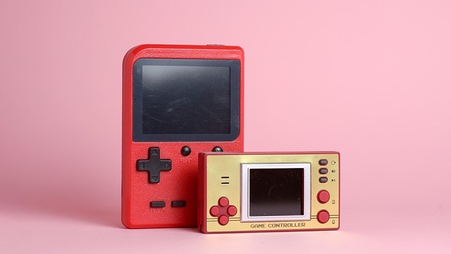 Pink Game Boy Advance with game cartridges, celebrating 25 years.
