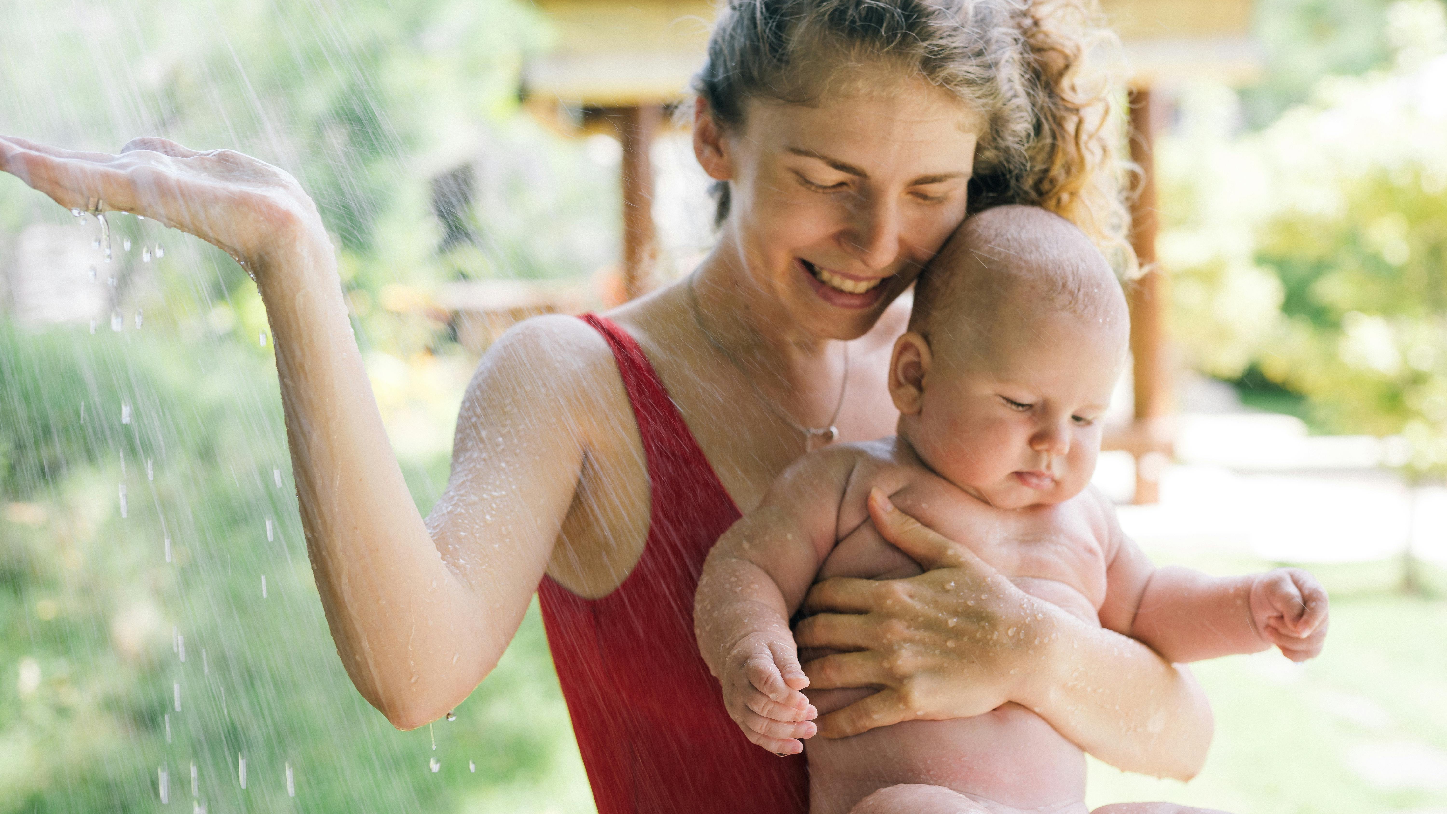 Motherhood and mental health portrayed in an autumn forest setting.