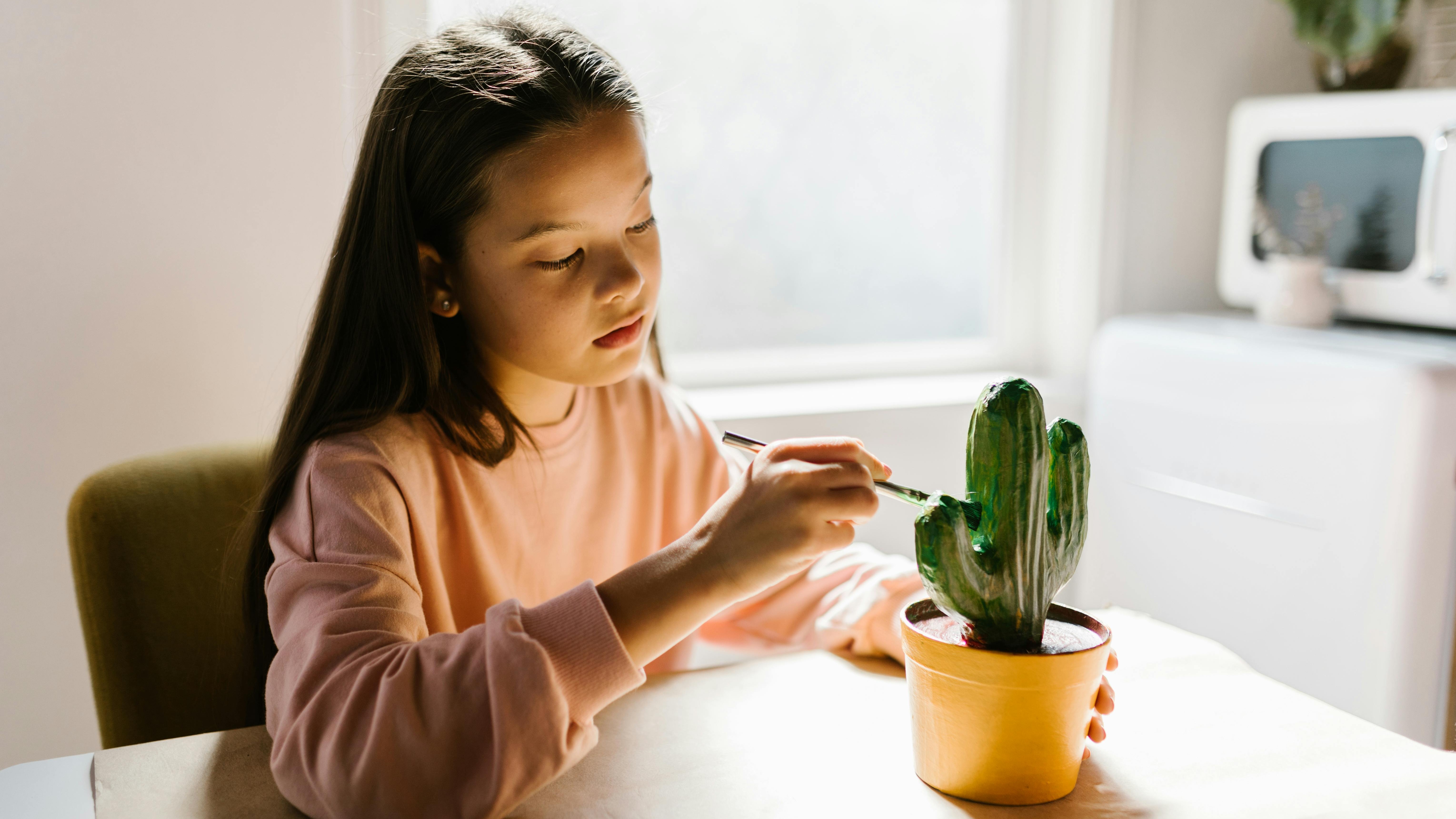 Child practicing ADHD balance activities indoors.