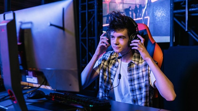 Optimize Ping for Online Gaming: High-tech gaming setup with red lighting.