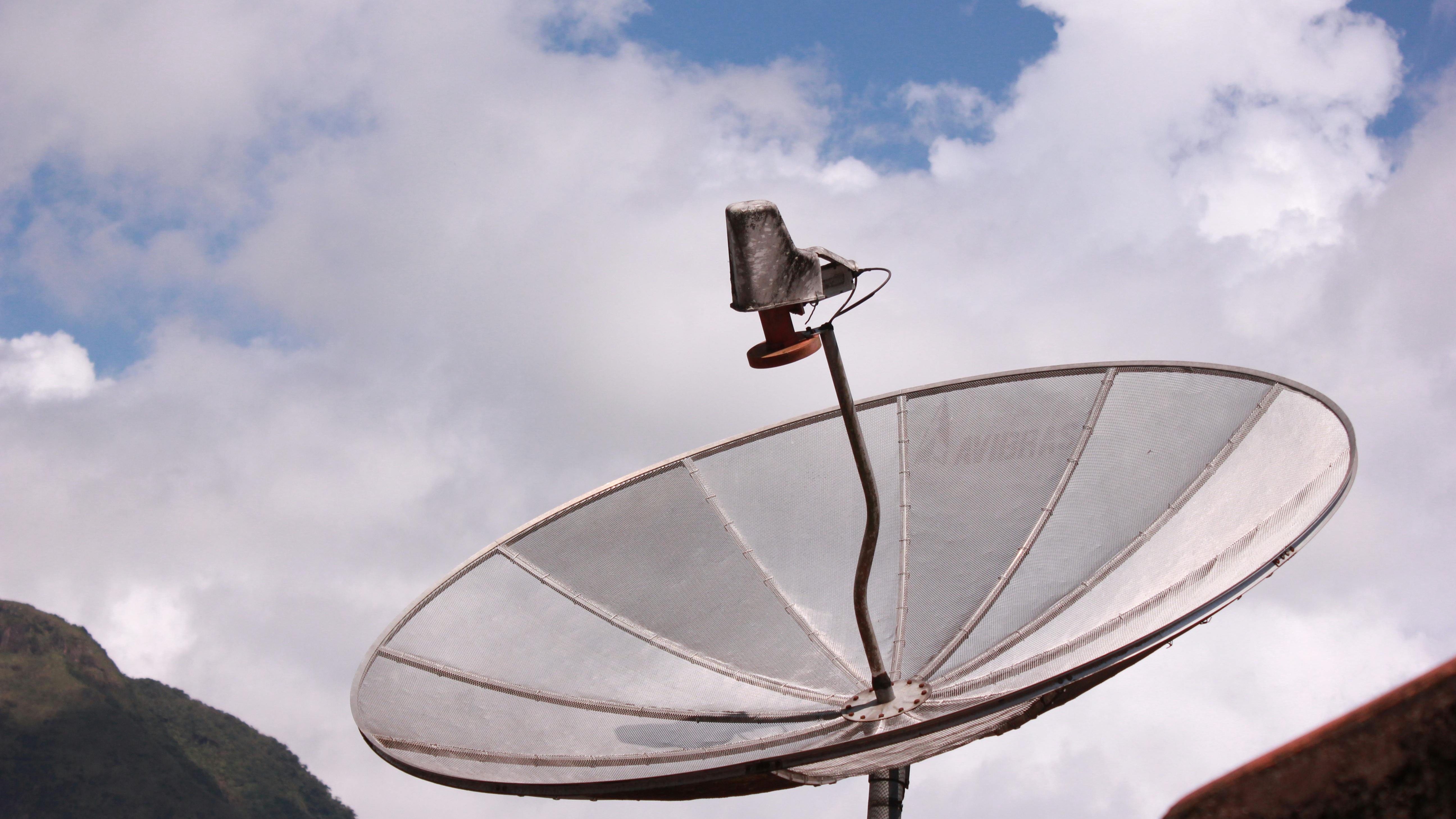 Abstract digital globe representing satellite internet investment deals