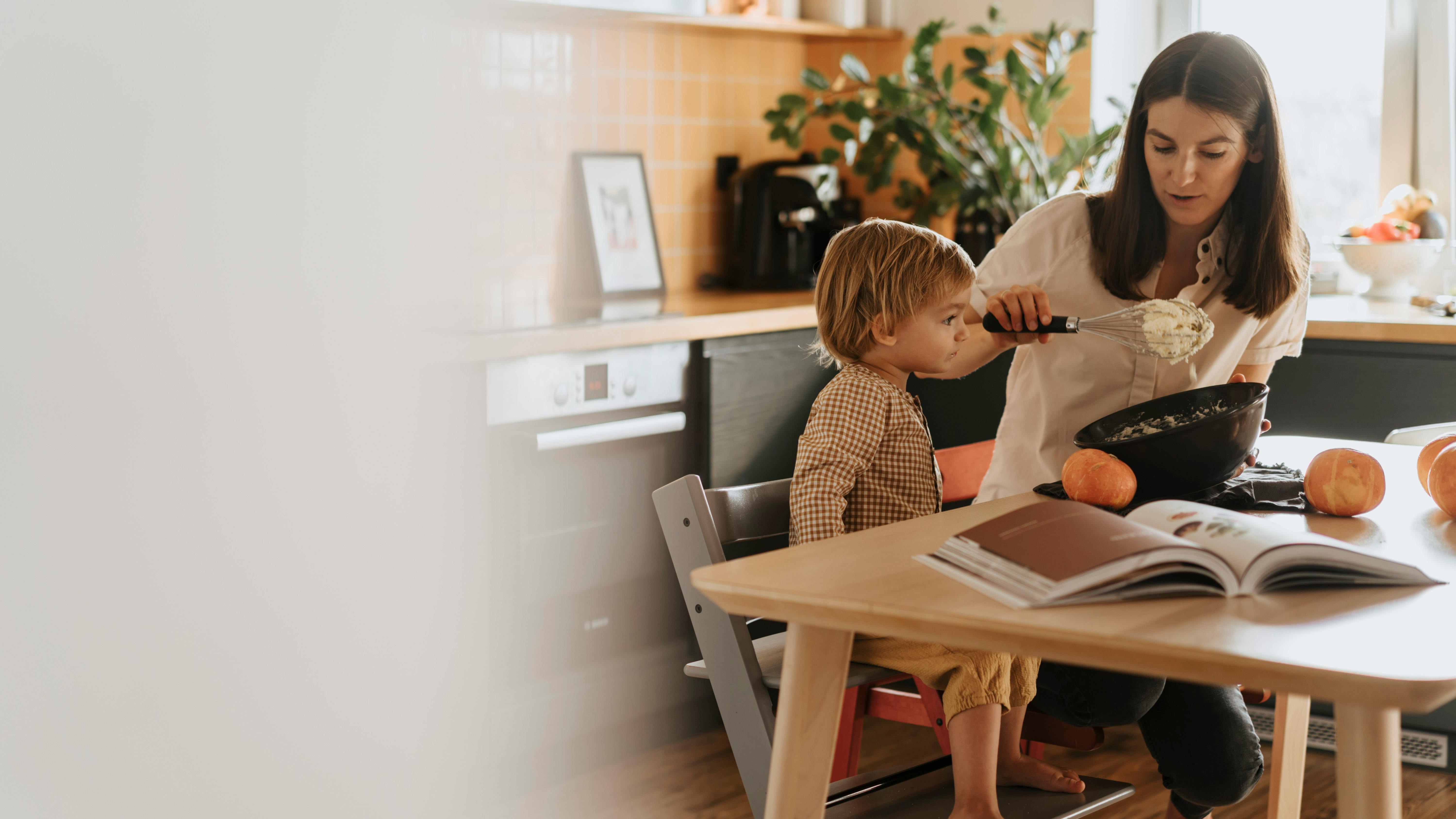 Delicious tacos with chicken for kids on a marble countertop.