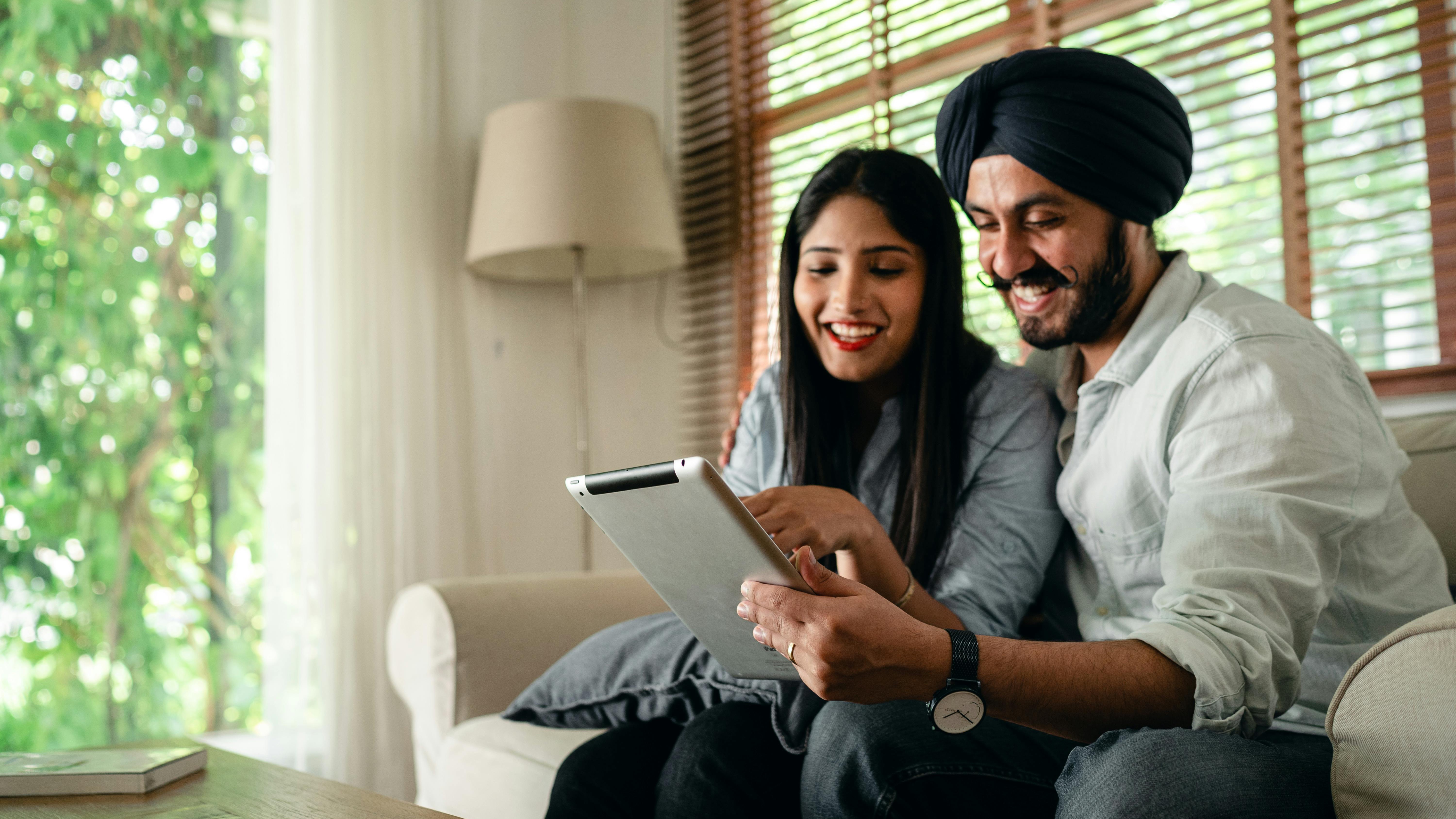 Black t-shirt with 'LAND IS POWER' vintage photo, raising bicultural children