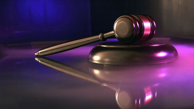 Close-up of VA seal on a door; exploring VA disability exposure.