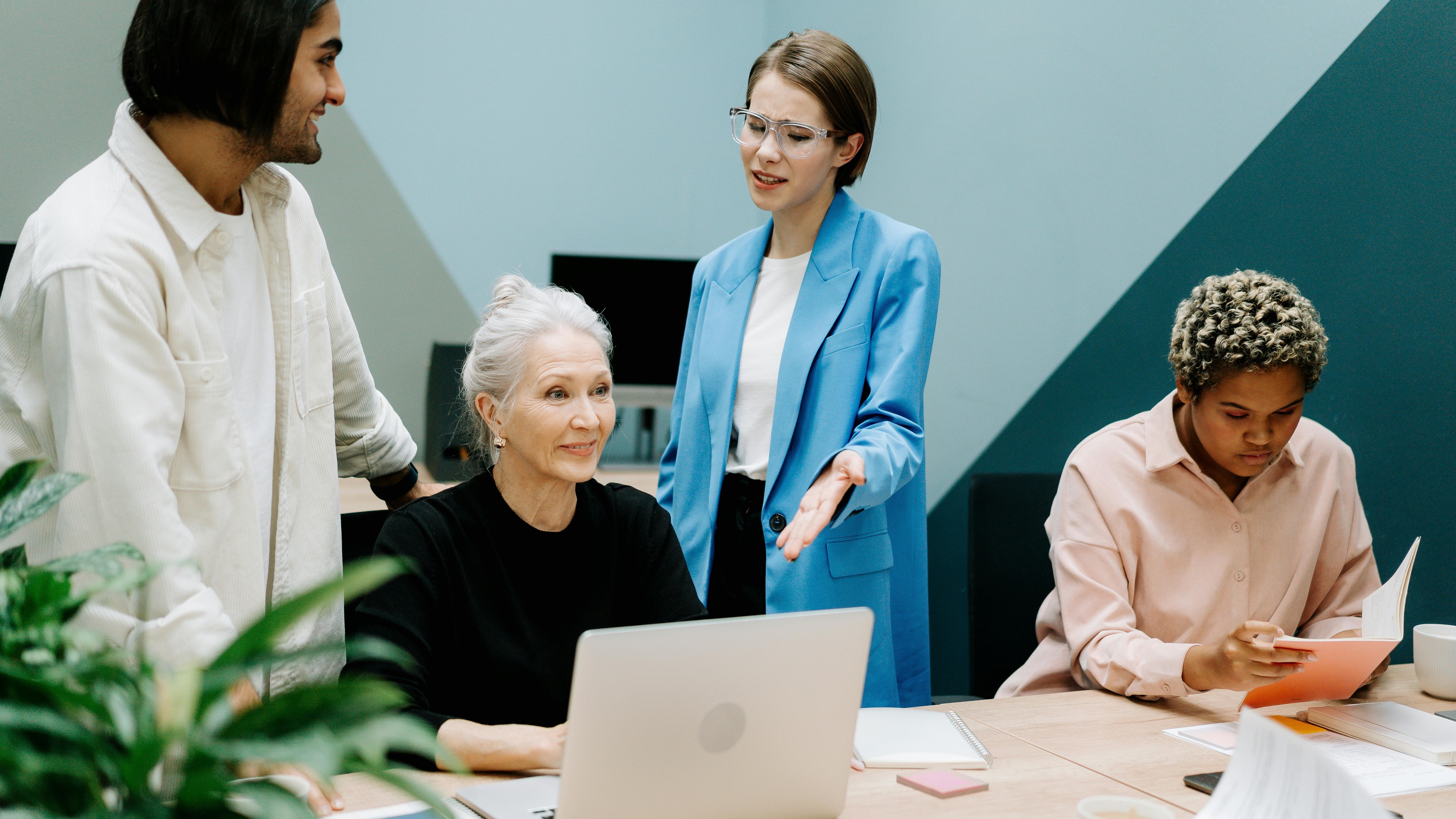 Employee Resource Groups news with stock market chart background.