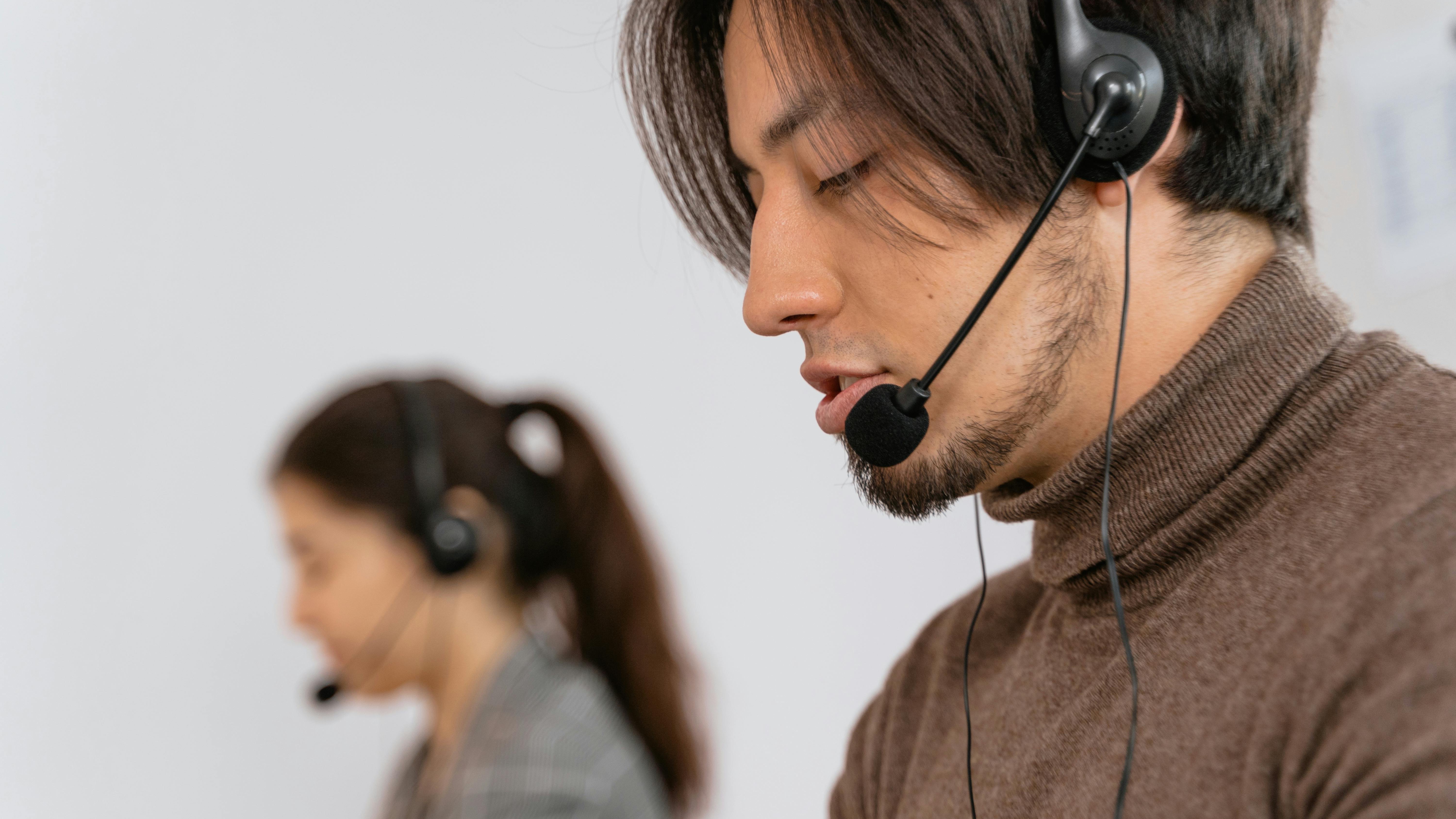 Tech office showing Griptape Automation screens for customer support automation.