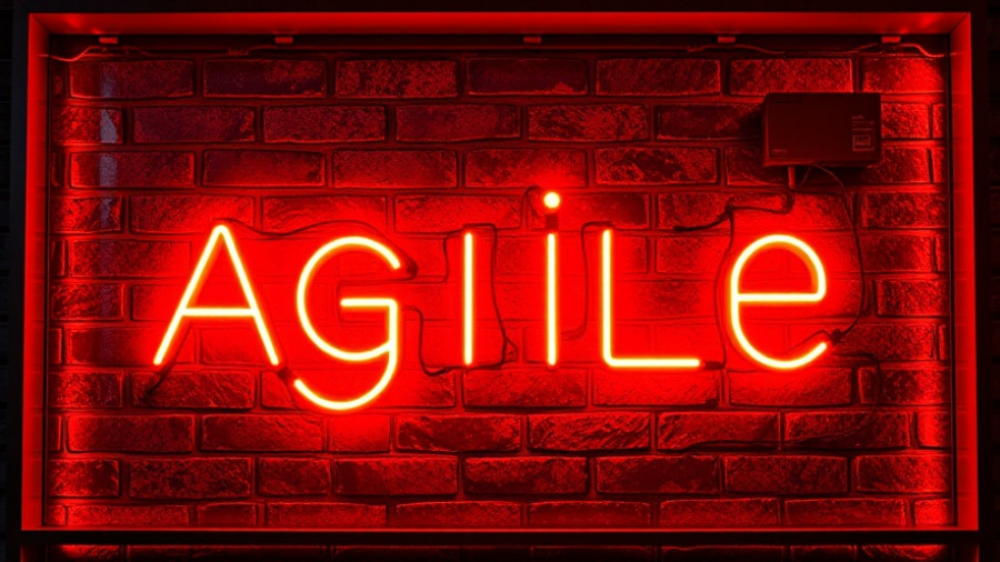 Orange neon 'AGILE' sign against dark brick wall, highlighting agile workers' priorities.
