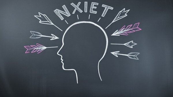 Chalk drawing of thoughts in head symbolizing essential nutrient linked to anxiety.