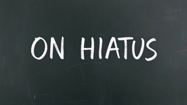 Chalkboard with 'ON HIATUS' text representing taking strategic pauses in business.