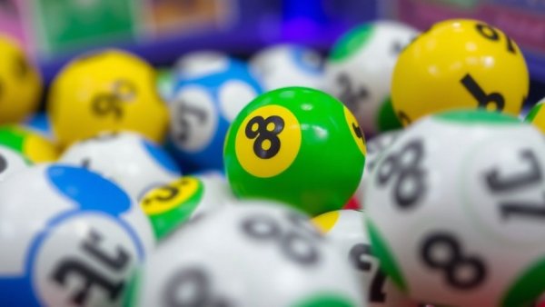 Colorful lottery balls in motion symbolizing La Bañeza Christmas lottery win.
