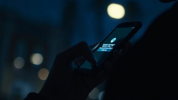 Urgent alert on smartphone highlighting a serious issue.