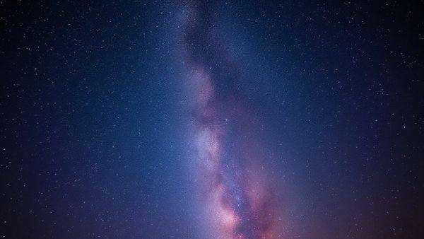 Starry night sky with Milky Way, serene and tranquil.