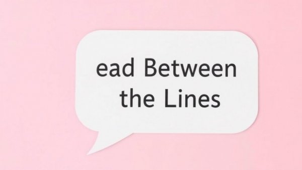 Simple speech bubble reading 'Read Between the Lines' on a pink background.
