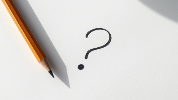 Pencil and eraser with question mark on paper, validate your startup idea.