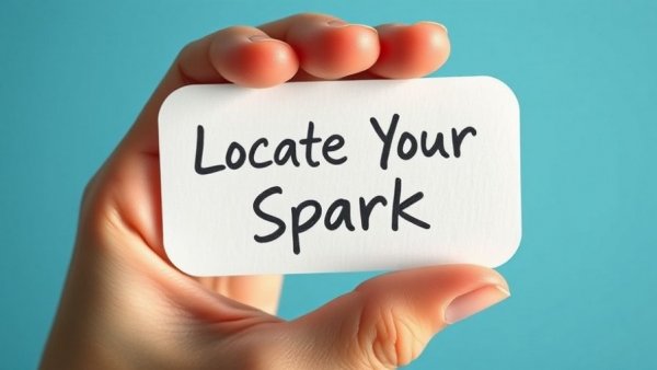 Hand holding a card with 'Locate Your Spark' text for YouTube script inspiration.