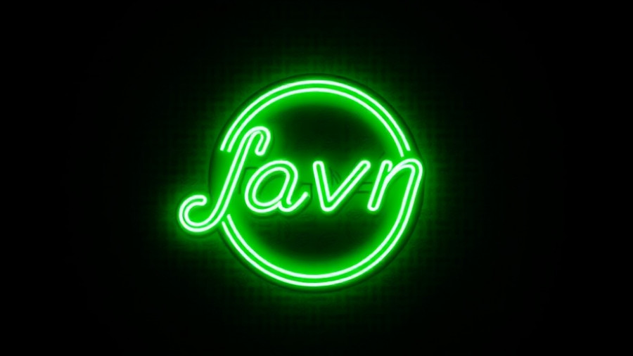 Neon green TC logo glowing on a dark background.