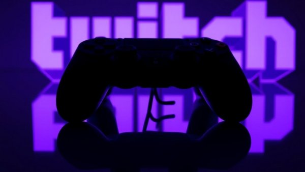 Gaming controller silhouette with Twitch logo, Australia bans Twitch for teens.