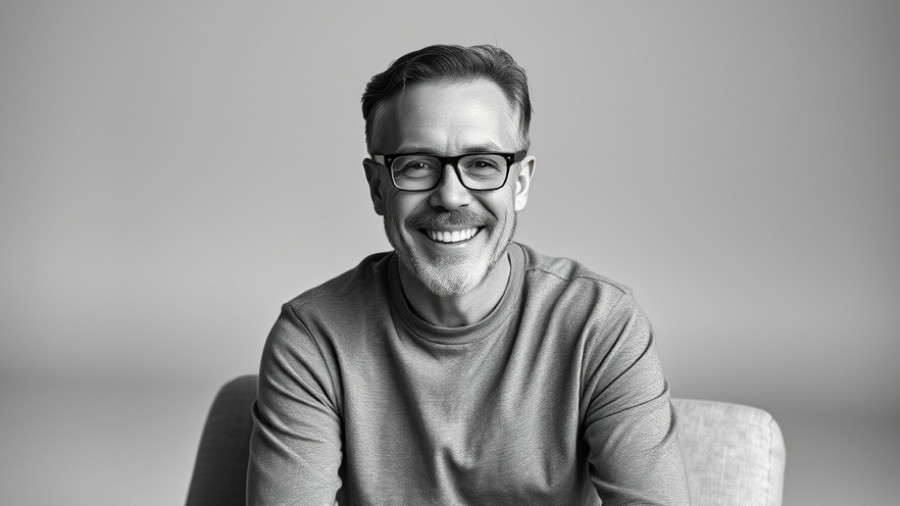 Casual black and white portrait of a person in a studio setting.